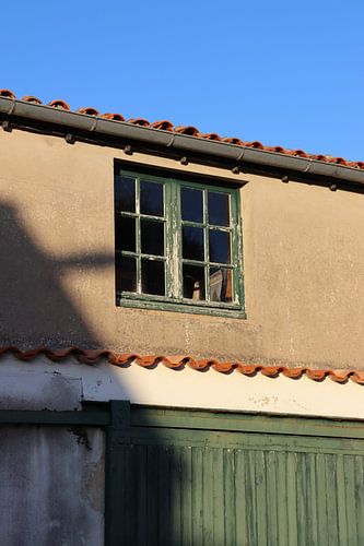 French house with blue sky