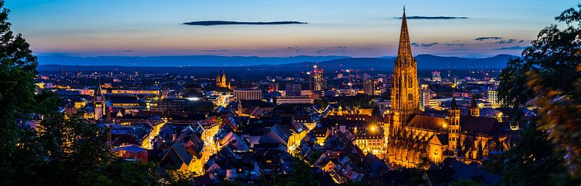 Freiburg im Breisgau from above in summer in magical twilight atmosphere XXL panorama of city by adventure-photos