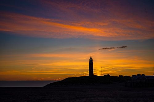 Texel lighthouse with sun pillar at sunrise