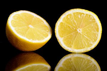 Fresh yellow lemon cross section by Sjoerd van der Wal Photography