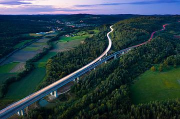 Aerial view of the motorway in the evening by Raphotography