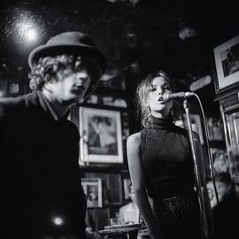 young woman sings in a band by Joost Berndes