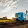 The train in the Dutch landscape: Barneveld-North by John Verbruggen