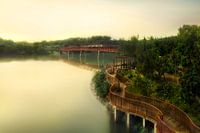 Romantic river with bridge in Asia.