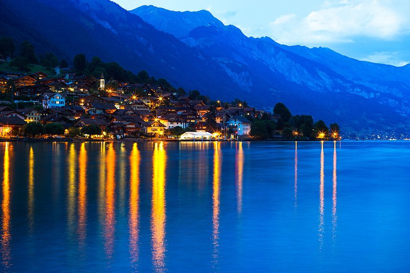 View over the lake of Brienz to Oberried near Interlaken at blue hour by Leo Schindzielorz