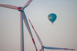 Wind turbines and hot air balloon near Garzweiler by Michael Ruland