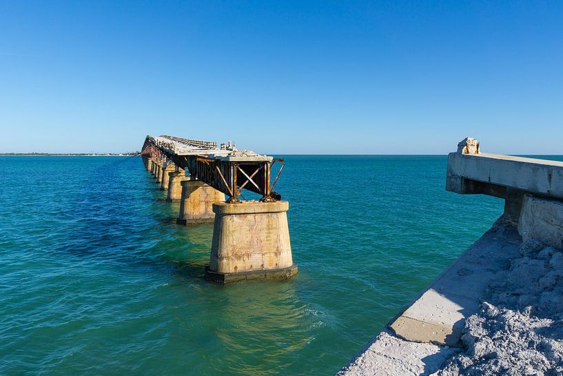 USA, Florida, Ruins of old rusty railroad bridge through the ocean by adventure-photos