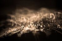 Water drop on a lint with bokeh in the form of a musical note