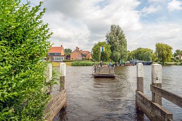 Small ferry on the way by Ruud Morijn
