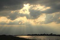 Zonnestralen op de Lek