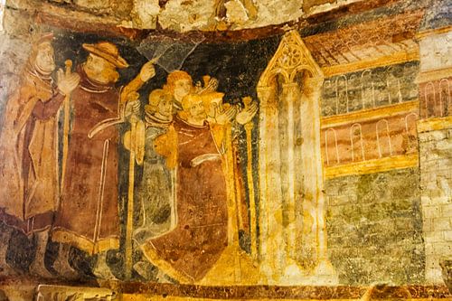 A colourful fresco in the Church of Saint Pierre in Brancion, France