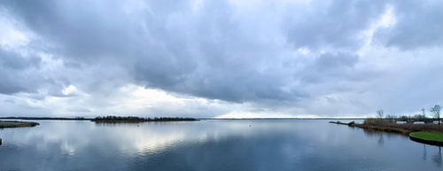 Dark clouds above the Lauwersmeer by Apple Brenner
