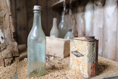 Bottles - still life in abandoned house