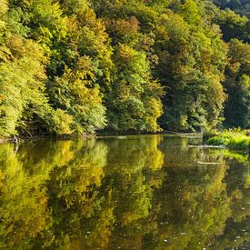 Autumnal atmosphere along the river by Colico