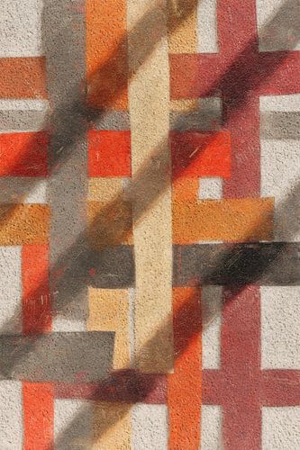 Geweven lijnen in rood en oker