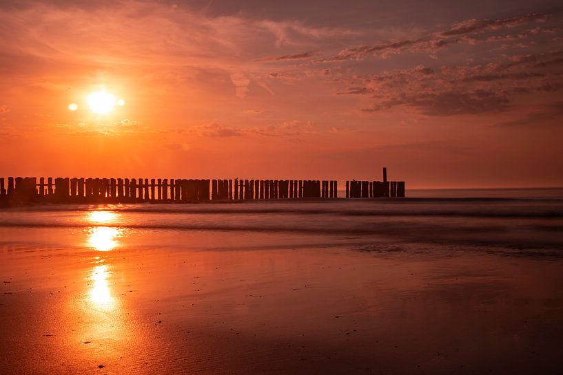 Zeeland, sunset at Westkapelle by Gert Hilbink
