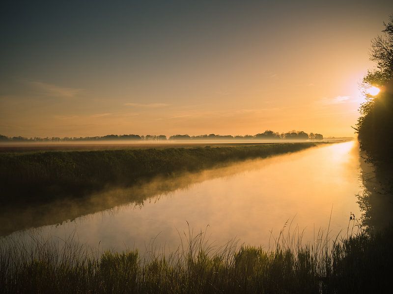 Sunset at water by Martijn Tilroe