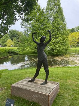Dancing woman statue