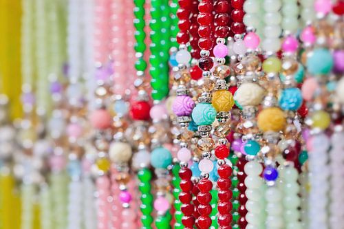 row of fashionable ornate multicolored bead strings
