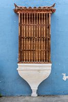 Blue facade of an old colonial house in Cartagena, Colombia