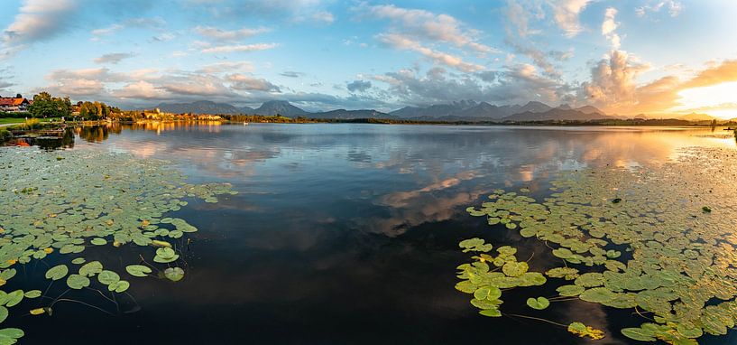 Sunset over the Hopfensee with panoramic view of the Allgäu by Leo Schindzielorz