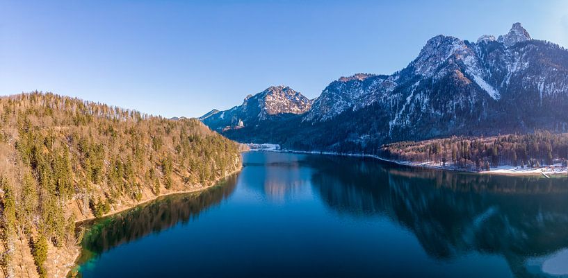 Aerial view of the Alpsee with castle Neuschwanstein, mountains and forests by Hans-Heinrich Runge