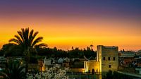 Huizen in Marrakech tijdens zonsondergang van Rene Siebring thumbnail
