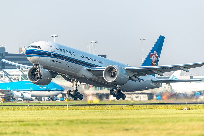 Boeing 777 cargo plane of China Southern Cargo takes off from Runway Buitenveldert in the early morn by Jaap van den Berg