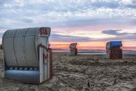 Beach chairs near Cuxhaven in the evening light by Norbert Sülzner thumbnail