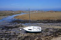Sailing boat on the beach with low tide in Brittany