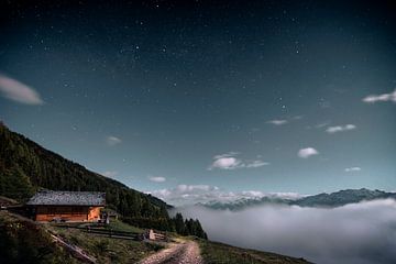 Above the clouds with moonlight by Joost Lagerweij