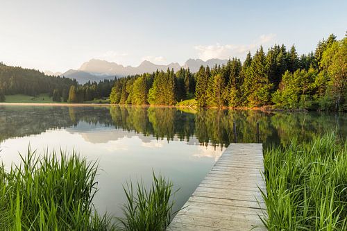 Karwendel Mountains reflected in the Geroldsee at sunrise, Bavaria, Germany