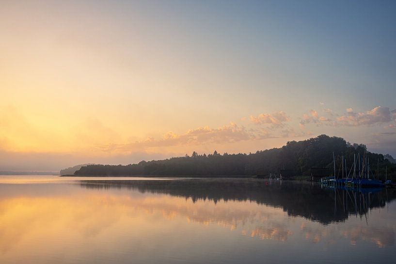 Sunrise in Seedorf am Schaalsee with clouds and reflection by Rico Ködder