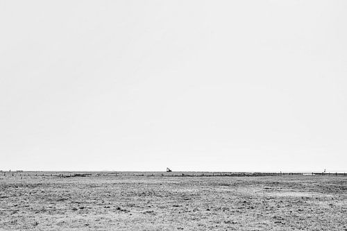 De eenzame baggermolen aan zee