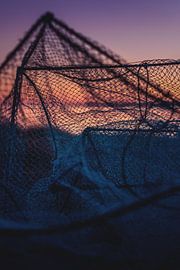 old fishing net in the morning by Florian Kunde
