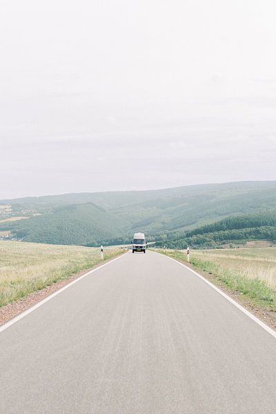 Vanlife - Oldtimer Mercedes camper van on the road in Germany by Milou van Ham