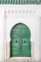 Green door in Tétouan in Morocco