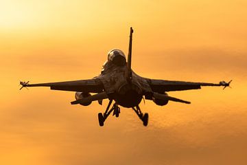 F-16 fighter aircraft during a beautiful sunset by KC Photography