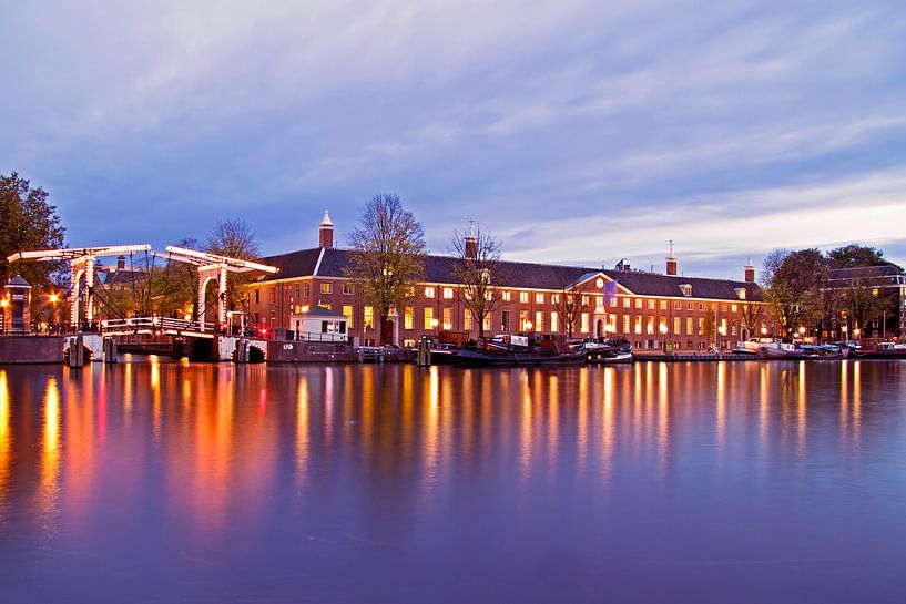 Cityscape of Amsterdam at sunset on the Amstel by Eye on You