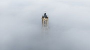 Dom tower in the morning mist in Utrecht by Bas van Setten