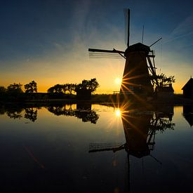 Windmills reflection by Jim Looise