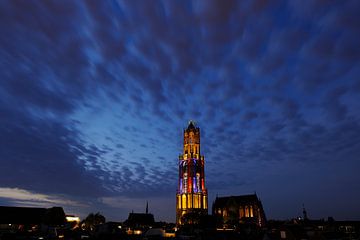 City view of Utrecht with Dom tower in colours French flag during the start of the Tour de France