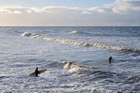 Surfers with surfboard