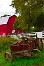 Red barn with rusty machine in foreground by Studio LE-gals thumbnail