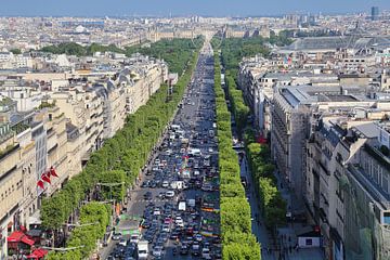 Cityscape of Paris, France, looking along the Champs Elysees towards a giant ferris wheel on Place d by Jan Kranendonk