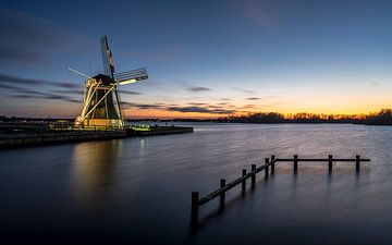 Mill De Helper on the Paterswoldsemeer lake by Henk Osinga