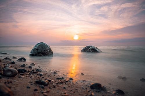 Sunset on the west beach near Ahrenshoop on the Baltic Sea. Fisc