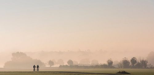 Cyclists in River Forelands in morning fog