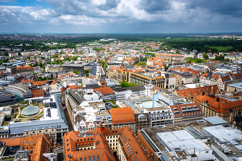 Leipzig city centre under a blue sky and clouds