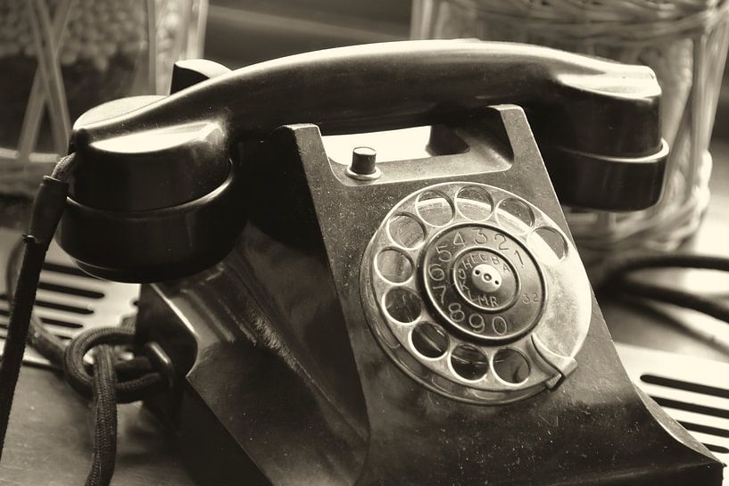 old analogue telephone with dial as decoration by Heiko Kueverling
